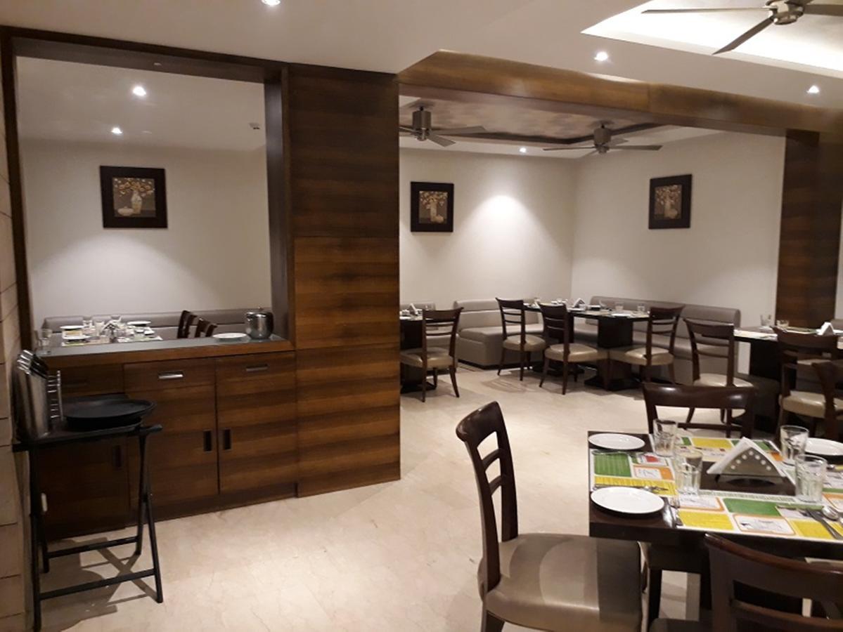 Lemon Tree Hotel Candolim Buitenkant foto